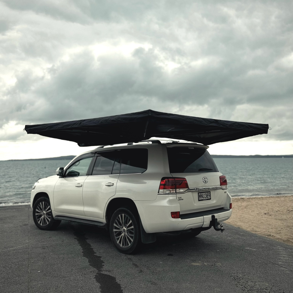 Stoke Mako 270 free-standing awning deployed along the side of an SUV, full side profile