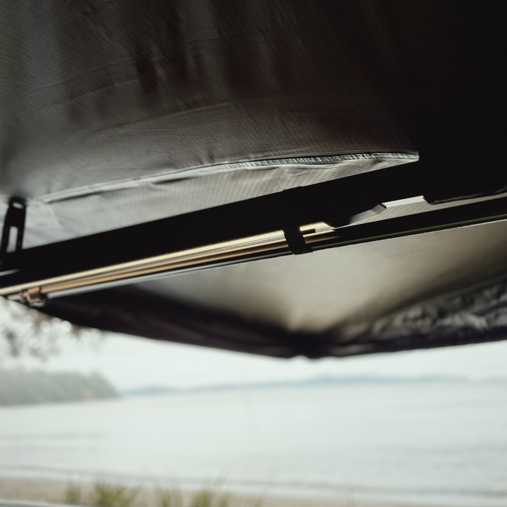 Stoke Mako 270 awning underside showing the aluminium support arms and canopy